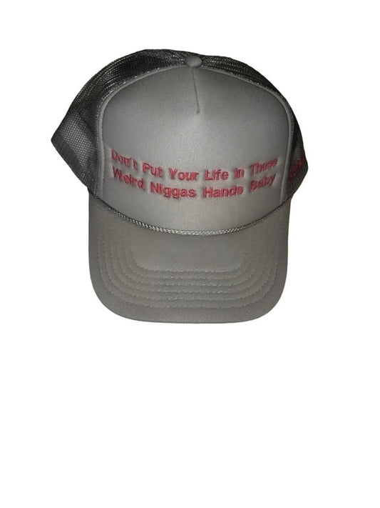 Don't put your life in these weird niggas hands baby unisex trucker hat
